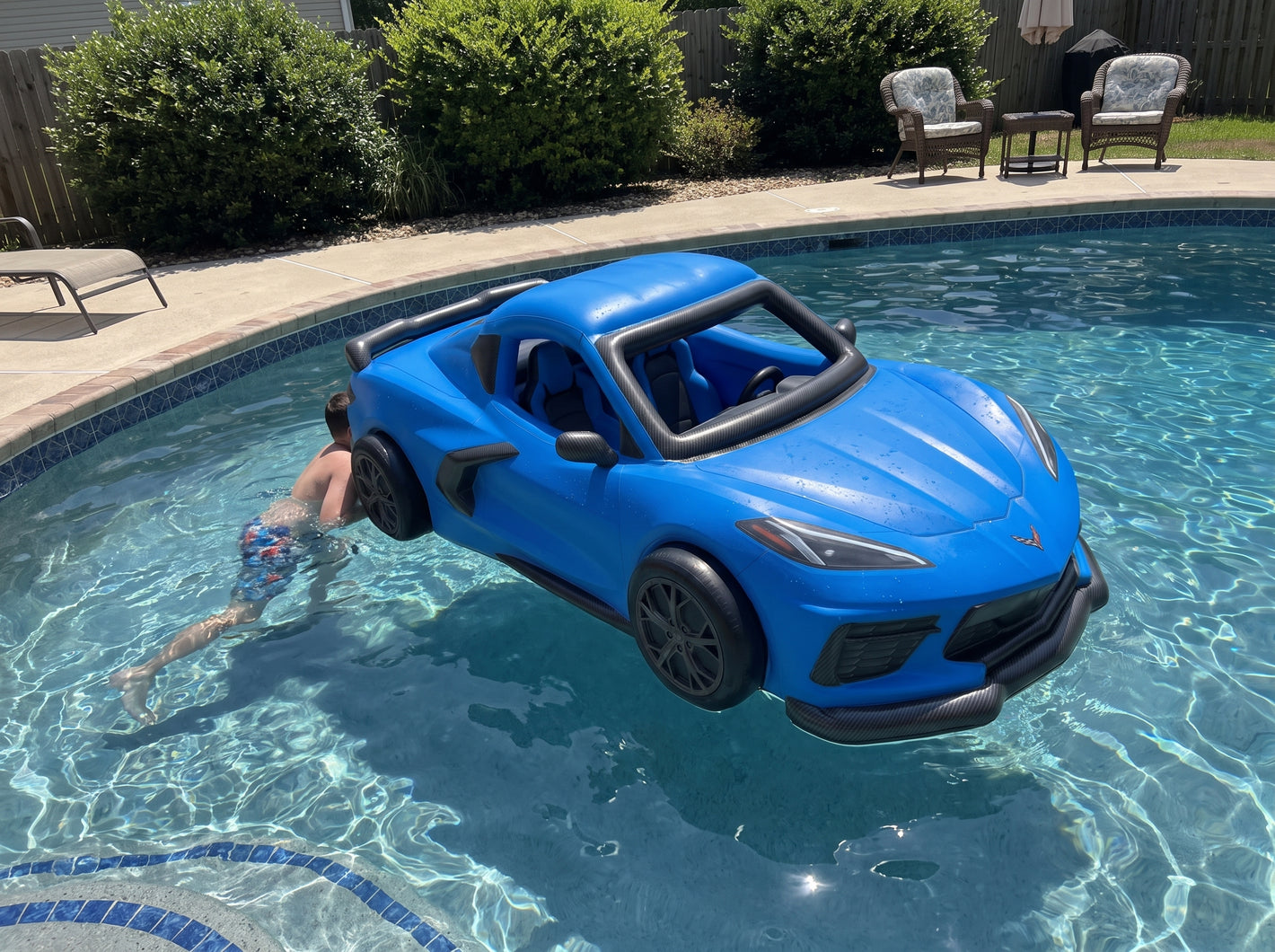 Customer photo - Corvette car float in pool